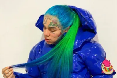 Rapper Tekashi 6ix9ine in federal custody on racketeering, firearms charges