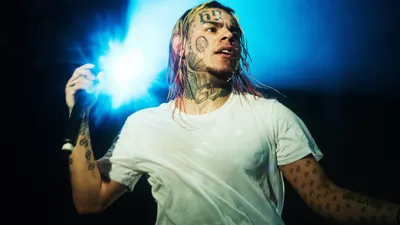 Tekashi 6ix9ine accuses Ariana Grande and Justin Bieber of buying No.1  spot. Billboard explains why that's not true | CNN