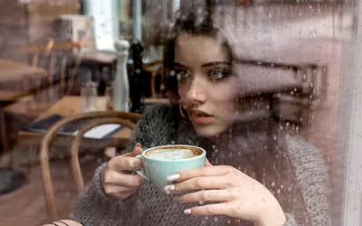 Curly Woman Drinking Coffee And Using Smartphone Free Stock Photo and Image  474070004