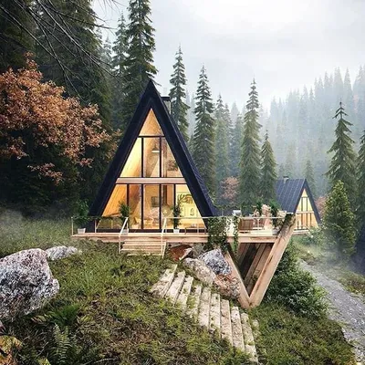 Дом в горах на фоне горы | Премиум Фото