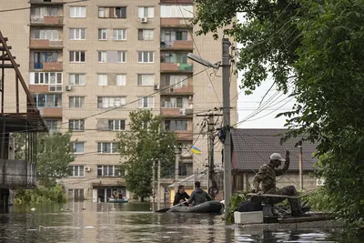 Последствия затопления Херсона. Фото дня