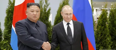 В фотографиях | Знаменитые рукопожатия Ким Чен Ына с мировыми лидерами на протяжении многих лет