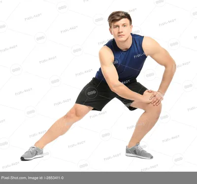 Молодой красивый спортсмен делает упражнения на цветном фоне :: Стоковая  фотография :: Pixel-Shot Studio