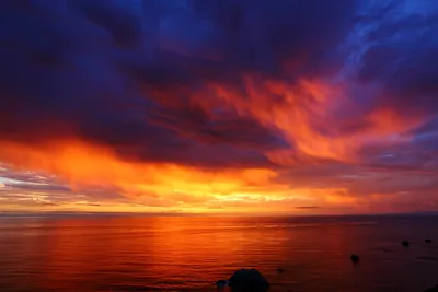 Закат солнца посреди лазурного океана…» — создано в Шедевруме