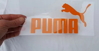 The Origins of Jumping Cat in Puma Logo — The Designest