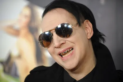 Marilyn Manson fined for blowing nose on concert camerawoman