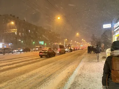 В городе снегопад. Фотограф Валерий