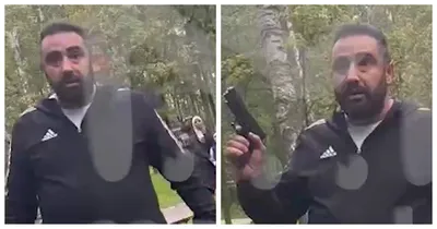 Преступник-мужчина с пистолетом на сером фоне :: Стоковая фотография ::  Pixel-Shot Studio