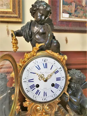 Часы с амурами «Аллегория любви» в стиле ар-нуво - лот {$item_id} каталоге  онлайн-аукциона старинных вещей ARTLOT24 в Санкт-Петербурге и Москве