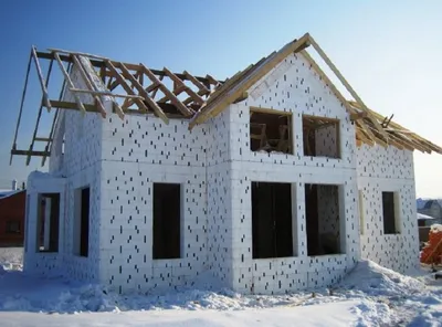 Строительство дома зимой - плюсы и минусы зимнего строительства