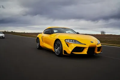 Toyota supra mk4 with aurora background on Craiyon