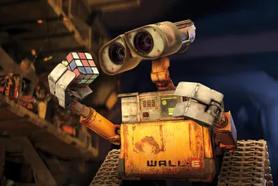 Фото Валли и Ева из мультфильма 'ВАЛЛ-И / WALL-E' сидят в кинотеатре