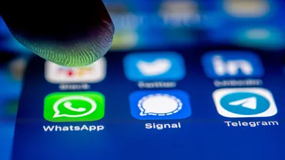 How to stop WhatsApp from saving images to Photos app on iPhone